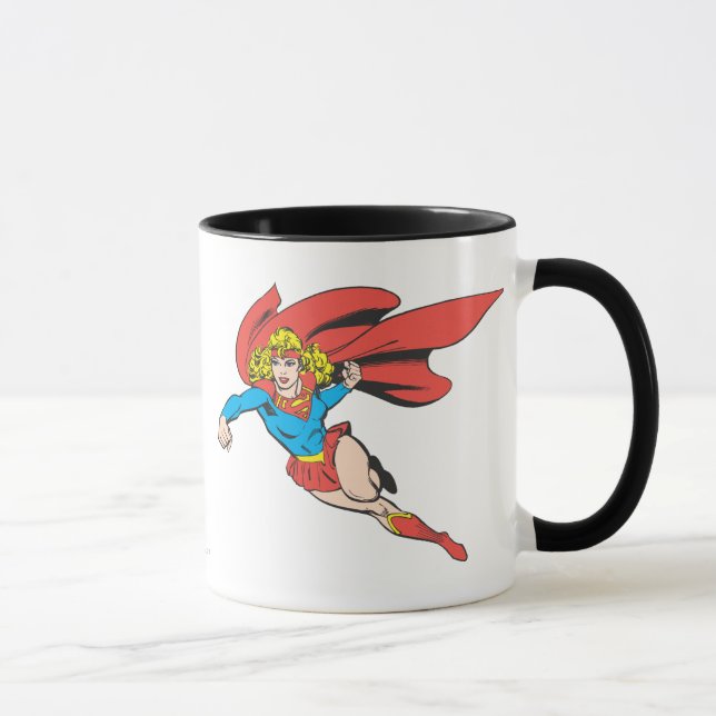Supergirl Leaps and Slår Mugg (Höger)