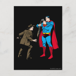 Superman böjer en pistol vykort