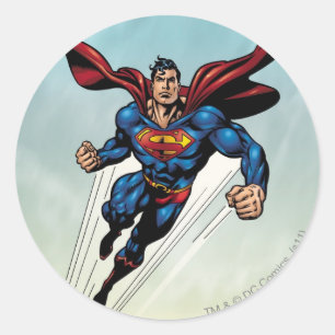 Superman hoppar uppåt runt klistermärke