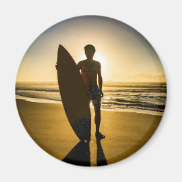 Surfer silhuett under soluppgång magnet