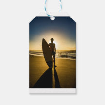 Surfer silhuett under soluppgång