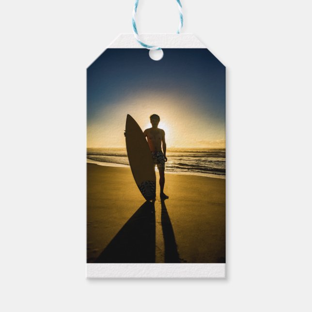 Surfer silhuett under soluppgång presentetikett (Framsidan)