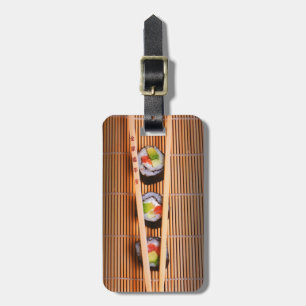 Sushi och träpinnar bagagebricka