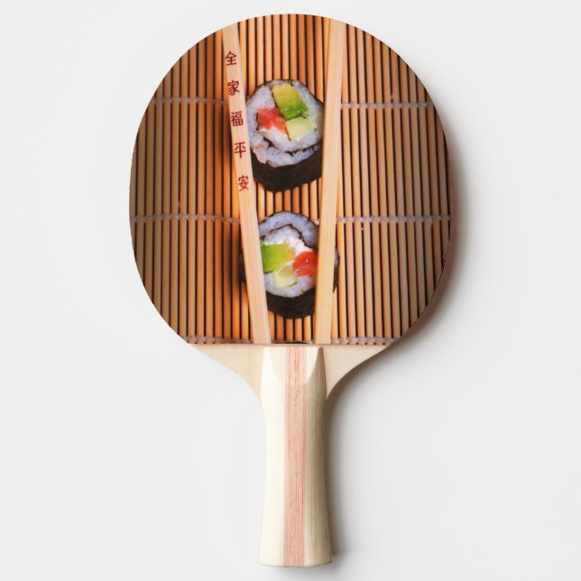 Sushi och träpinnar pingisracket (Framsidan)