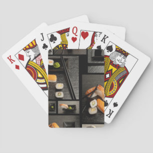 Sushisamling på svart bakgrund casinokort
