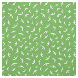 Sväljer och snurrar för vit grönt tyg