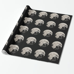 Svälla pappra måne bakom svart löv presentpapper