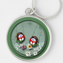 Svängande roligt rund silverfärgad nyckelring