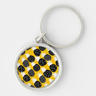 Svart ananas rund silverfärgad nyckelring