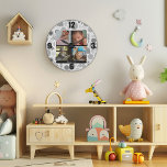 Svart Anpassningsbar, Baby, lås för fotomakning av Stor Klocka<br><div class="desc">Vår "Anpassningsbar Baby Photo Collage Wall Clock" är en tidslask som fångar de flyktigaste stunderna i baby första milstolpar. Som varje sekund tickar på, påminner klockan er om de dyrbara tidigt-stadierna i livet som går alltför fort. Designad med ett mjukt grått foliage mönster, erbjuder den ett modernt men ömtåligt ramverk...</div>