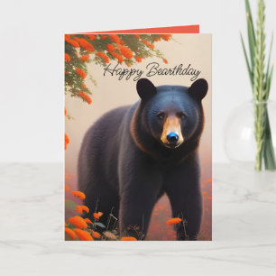 Svart björn i orange blommor kort