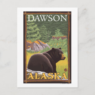 Svart björn i skog - Dawson, Alaska Vykort