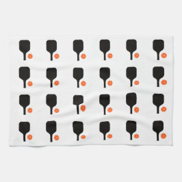 Svart burkpadlar och orange bollar handduva kökshandduk