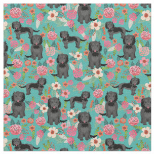 Svart cockapoo-hund-blommigt tyg