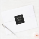 Svart Elegant Bröllop Tack Fyrkantigt Klistermärke<br><div class="desc">Ett enkelt "Tack"-klistermärke/kuvertförsegling med elegant som ska koordineras med mitt bröllop-tack och som innehåller ett klassiskt,  svalt skriptteckensnitt. Malltexten är helt redigerbar,  så teckensnittet stil,  storlek,  färg och placering kan ändras. Textbilden "Tack" kan ändras och flyttat runt med hjälp av verktygen Redigera. Finns även som rund klistermärke.</div>