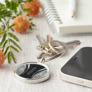 Svart elegant och silverblommigtdamaster rund silverfärgad nyckelring