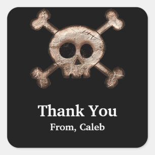 Svart etikett med tryckt SKULL-boner