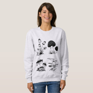 Svart för många champinjoner på vit tee shirt