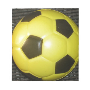 Svart fotboll och Gult Anteckningsblock