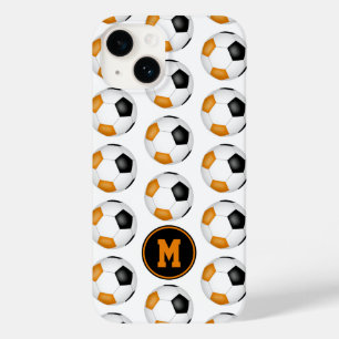 Svart fotbollar med orange mönster monogrammat