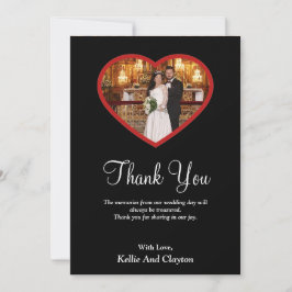 Svart foto innanför ett hjärttackkort tack kort