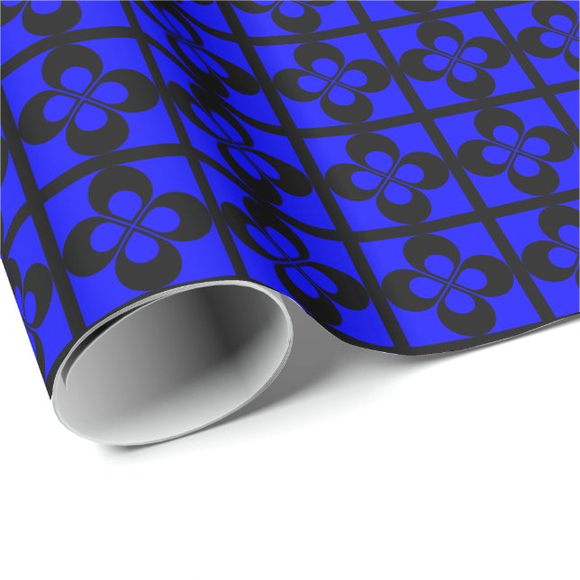 Svart geometriskt blommönster på blå presentpapper (Rullad Hörn)
