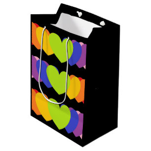 Svart gift-ruta med regnbåge av olika storlekar 