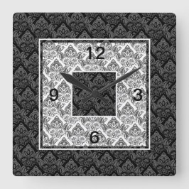 Svart, grått, vit väggklocka