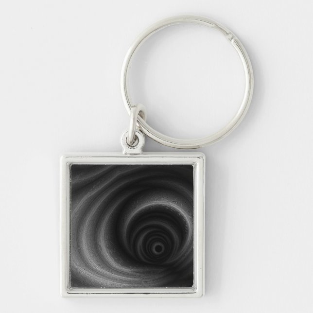 Svart gravitation fyrkantig silverfärgad nyckelring (Framsidan)