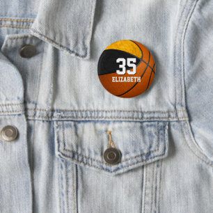 Svart guld-flickornas basketbolllag (jersey number knapp