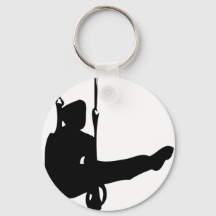 svart gymnastsymbol nyckelring