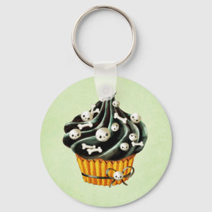 Svart Halloween muffin med mycket liten döskallar Nyckelring