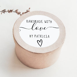 Svart, handgjord kärlek-typografi runt klistermärke