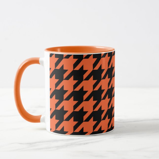 Svart houndstooth-kontroll för orange mugg (Vänster)