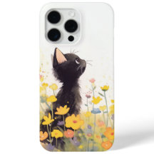 Svart katt bland blommorna