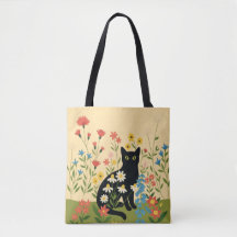 Svart katt bland färgglada vildblommor – Cottageco