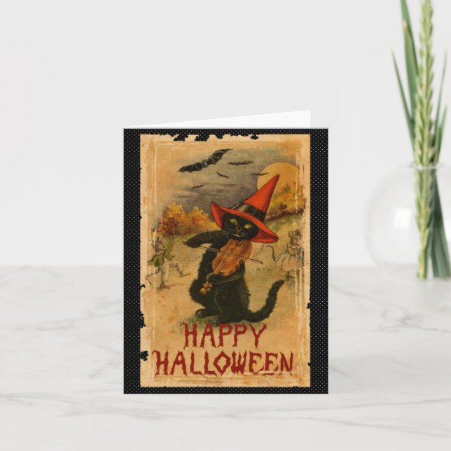 Svart katt för happy halloween som leker kort (Framsida)
