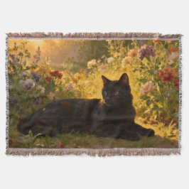 Svart katt i blommorna I Filt