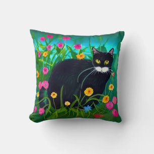Svart katt i en färglös Blomsterträdgård Kudde