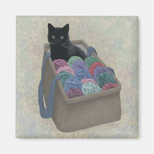 Svart katt i garnväska magnet