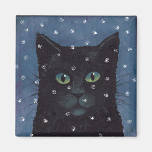 svart katt i vintersnö magnet