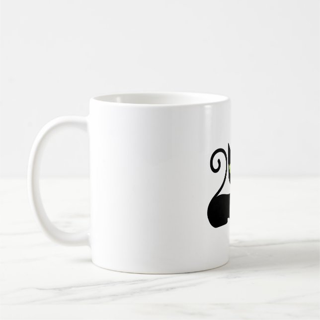 svart katt med blomma kaffemugg (Vänster)