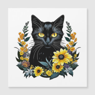 svart katt med blommor