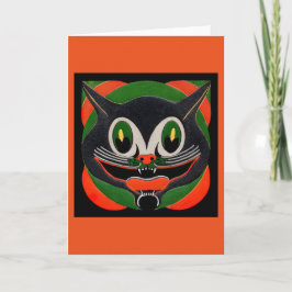 Svart katt med enormt leende kort