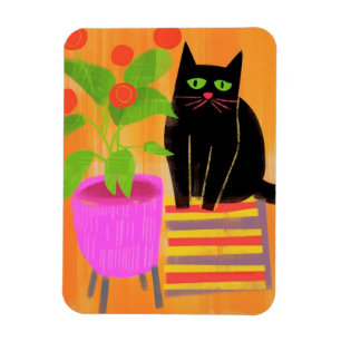 Svart katt med hushåll magnet