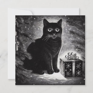 Svart katt med julpresent kort
