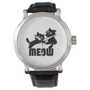 svart katt,mej armbandsur