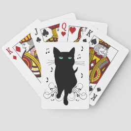 Svart katt omgiven av viskande toner av musik casinokort