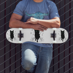 Svart katt omgiven av viskande toner av musik mini skateboard bräda 18,5 cm