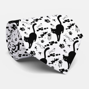 Svart katt på gatan slips